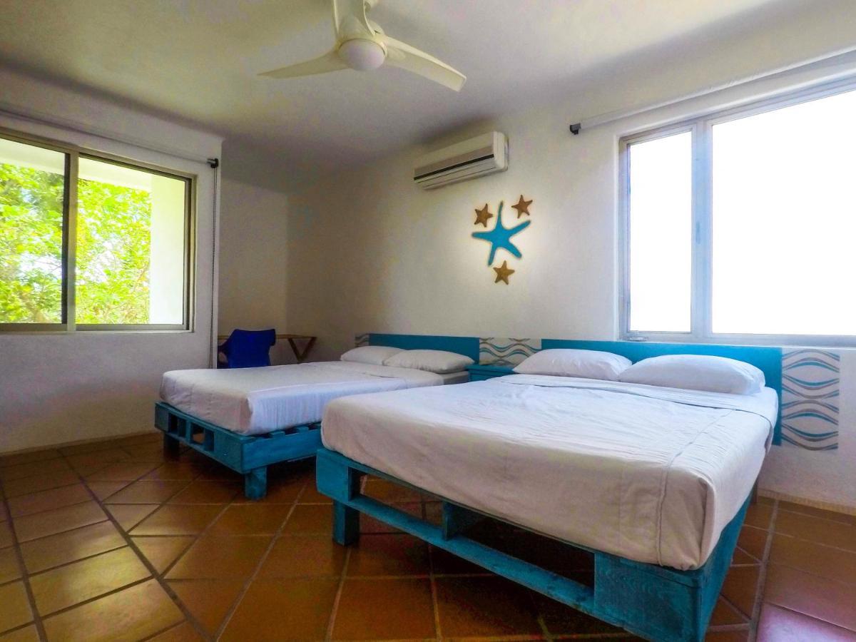 Punta Me Beach Suites Канкун Экстерьер фото