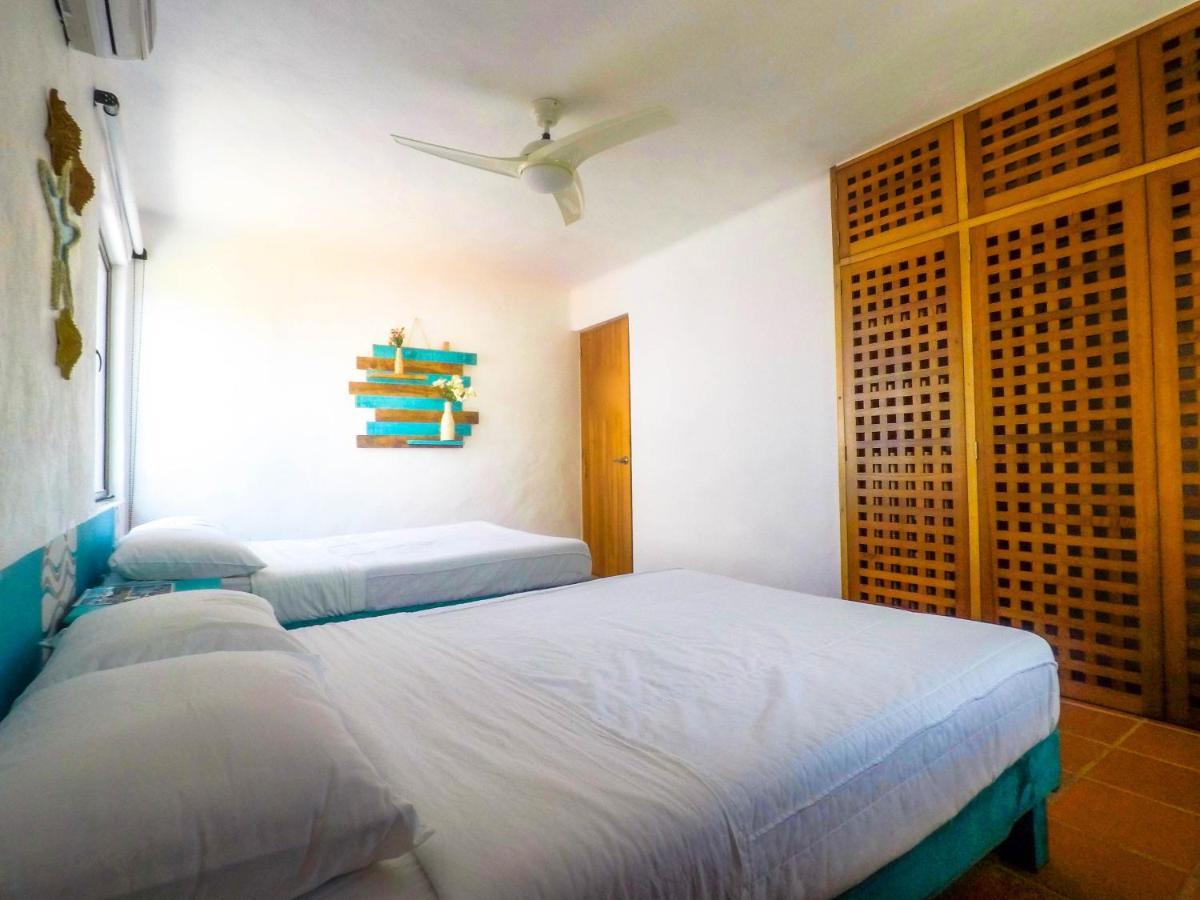 Punta Me Beach Suites Канкун Экстерьер фото